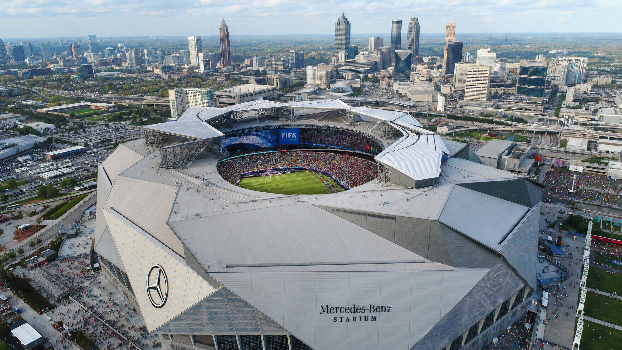 Mercedes-Benz Stadium in Atlanta packed for a FIFA World Cup 2026 match with Atlanta skyline visible